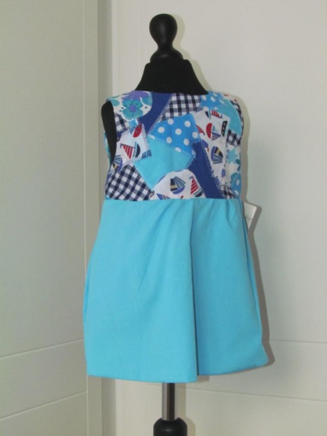 Pinafore styled with front opening