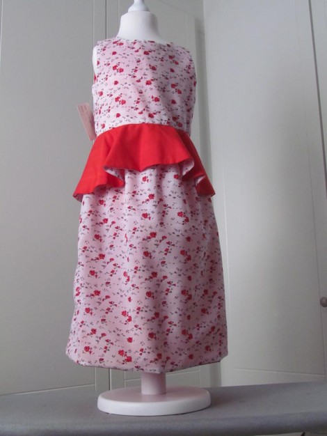 Sleeveless peplum dress
